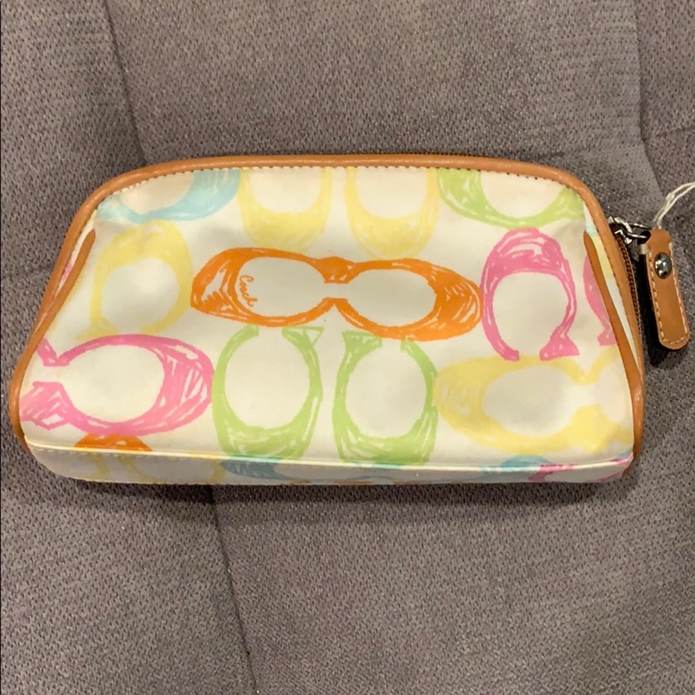 Small fabric Coach makeup bag